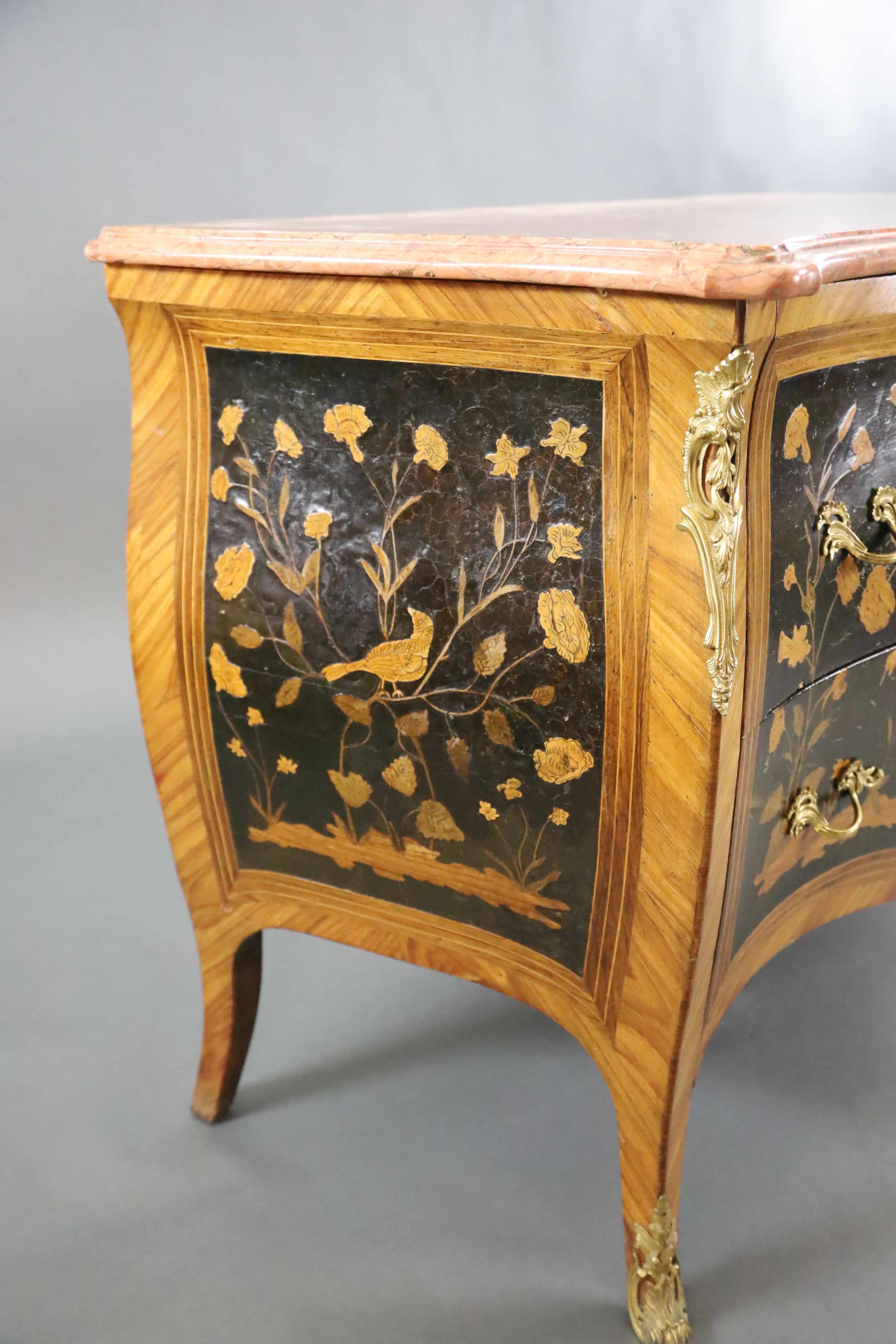 A French Louis XV style kingwood and ormolu mounted serpentine bombe commode, W.4ft D.2ft H.2ft 11in.